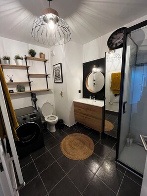 Shower, hair dryer, towels, soap