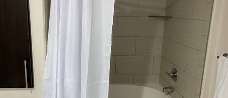 Hair dryer, towels, soap, toilet paper