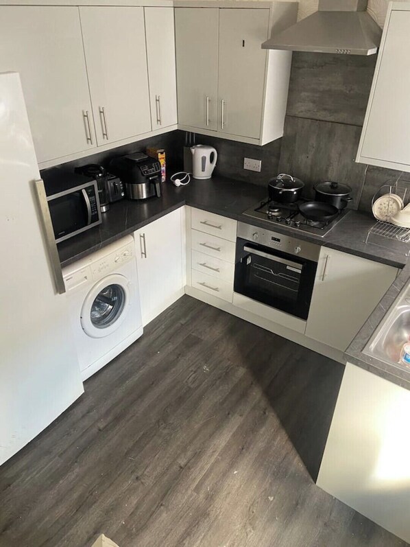 Refrigerador, horno, placa de cocina