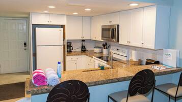 Condo, Multiple Beds, Kitchen (Surfside II 109) | Private kitchen | Fridge, microwave, oven, stovetop
