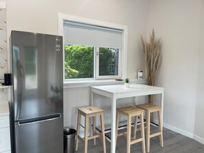 Fridge, coffee/tea maker, electric kettle, cookware/dishes/utensils