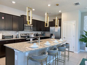 Fridge, microwave, oven, stovetop - NEW! 5 BR, 4.5 baths Villa at Windsor Island Resort, Heated Pool, FREE BBQ! (Davenport)