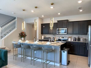 Fridge, microwave, oven, stovetop - NEW! 5 BR, 4.5 baths Villa at Windsor Island Resort, Heated Pool, FREE BBQ! (Davenport)