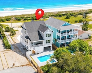 A large two-story house with a swimming pool, located near a beach. - OCEANFRONT LUXURY HOME-POOL+SPA+OUTDOOR KITCHEN (Atlantic Beach)