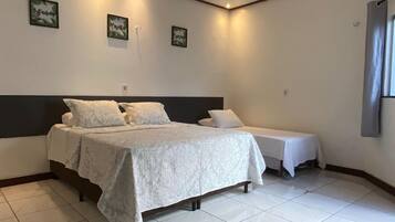 Habitación cuádruple Confort | Ropa de cama de alta calidad y minibar