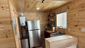 Coffee/tea maker, fridge, microwave, toaster
