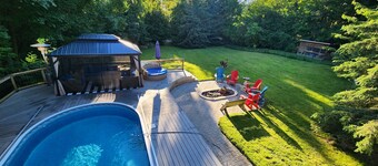 Cozy 2 bedroom basement with pool, jacuzzi, gym & sauna. Come see the chickens 