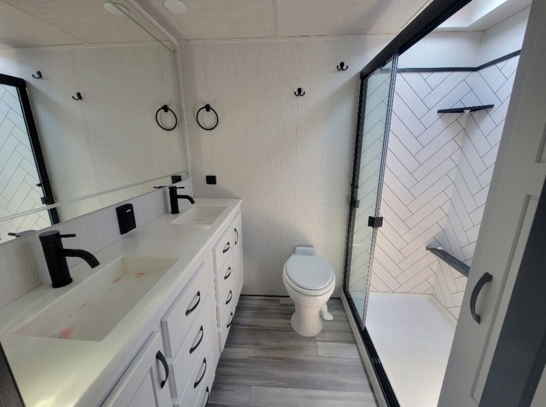 Beautiful fifth wheel by the river