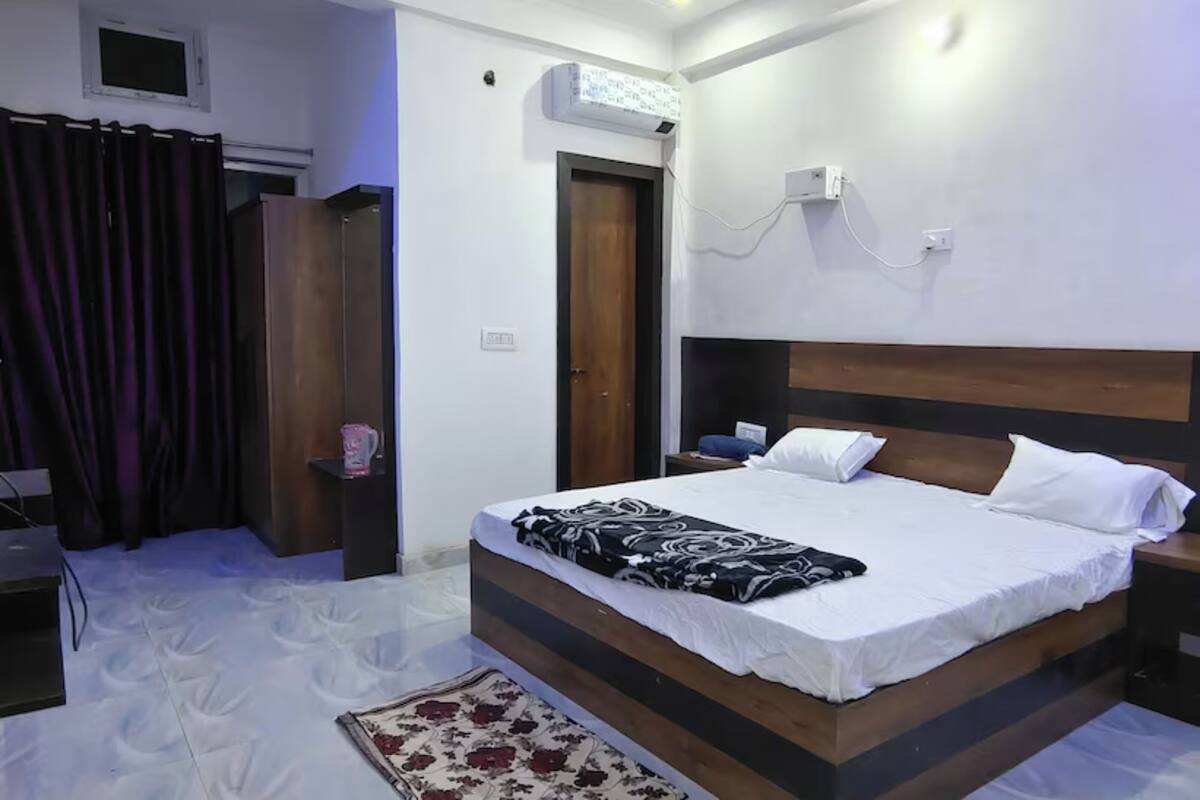 Habitación doble Deluxe, vista a la ciudad | 1 habitación, wifi gratis y ropa de cama