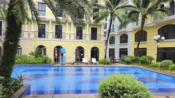 Outdoor pool, open 7:00 AM to 7:00 PM, sun loungers, lifeguards on site
