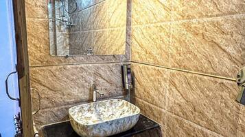 Shower, towels, soap, shampoo