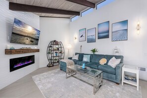 Smart TV, fireplace, books