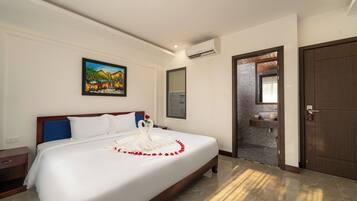 Premium bedding, pillowtop beds, desk, laptop workspace