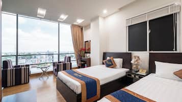 Family Triple Room, Multiple Beds, City View | Premium bedding, memory foam beds, minibar, in-room safe