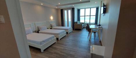 Comfort Triple Room, Sea View | Minibar, desk, blackout curtains, soundproofing