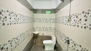 Shower, towels, soap, toilet paper