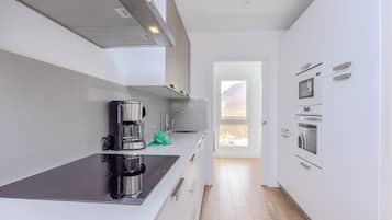 Oven, electric kettle, cleaning supplies