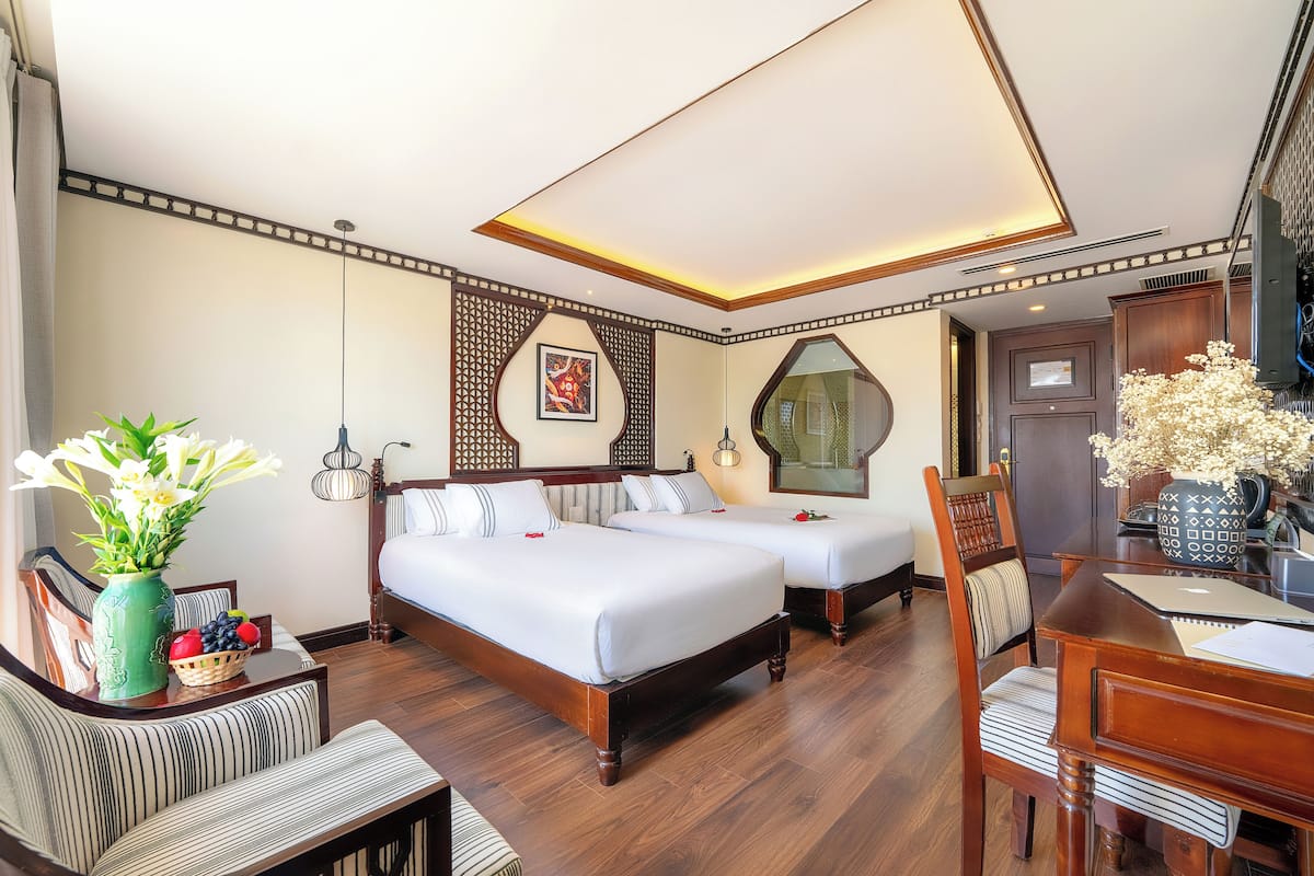 Luxe beddengoed, bedden met traagschuimmatras, een minibar