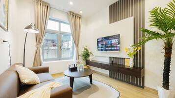 Chambre Familiale, baignoire | 1 chambre, rideaux occultants, fer et planche à repasser, Wi-Fi gratuit