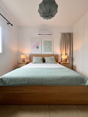 1 bedroom, desk, iron/ironing board, travel cot