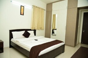 Deluxe Double Room, City View | In-room safe, desk, iron/ironing board, free WiFi