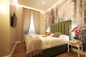 Deluxe kamer | Een kluis op de kamer, verduisterende gordijnen, geluiddichte muren