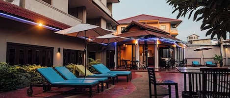 Outdoor pool, pool umbrellas, pool loungers