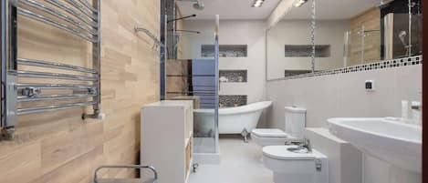 Shower, hair dryer, towels, shampoo