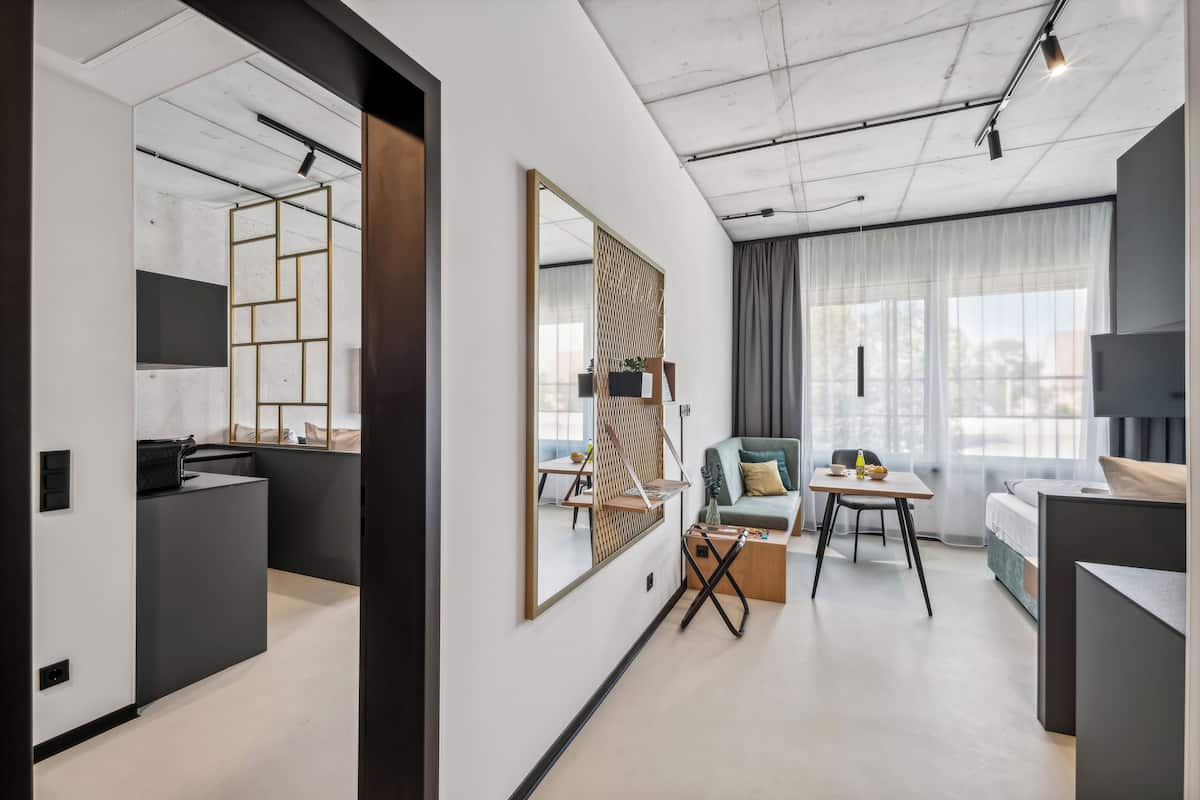 2 bedrooms, premium bedding, laptop workspace, soundproofing