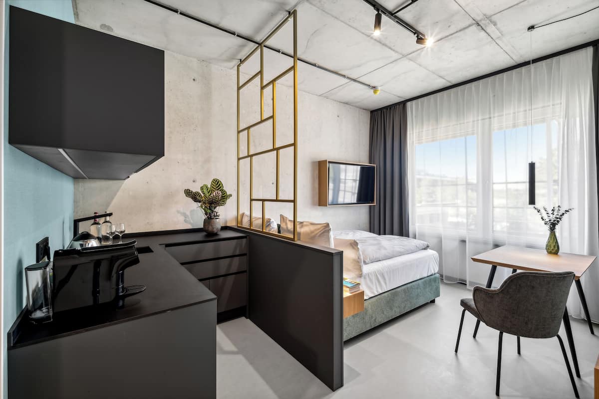 2 bedrooms, premium bedding, laptop workspace, soundproofing