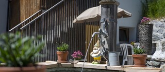 STUDIO NUNA: RENOVATED 1-ROOM FLAT IN THE FORMER MILL OF THE MOUNTAIN VILLAGE OF ARDEZ