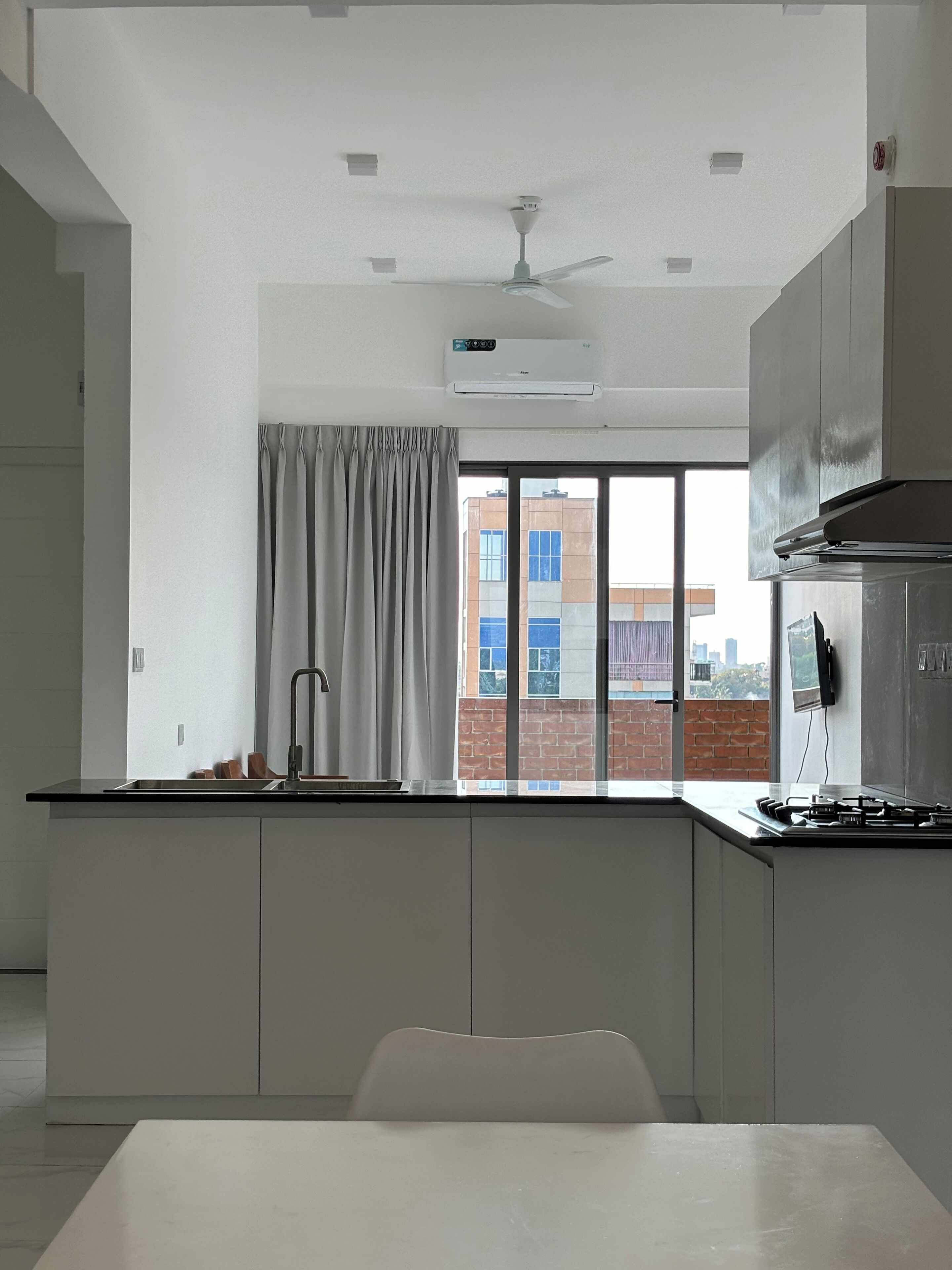 Penthouse, City View | Private kitchen | Mini-fridge, cookware/dishes/utensils, kitchen islands
