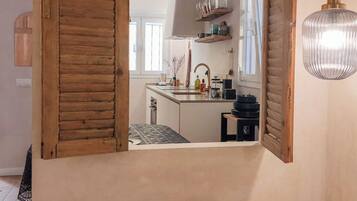 1 slaapkamer, een strijkplank/strijkijzer, wifi, beddengoed