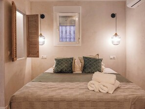 1 غرفة نوم ومكواة/لوح كي وواي فاي وملاءات أسرّة