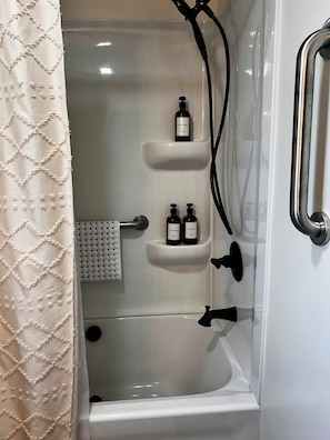 Shower, hair dryer, towels, soap