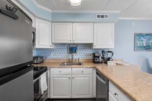 Fridge, microwave, oven, stovetop - Salty Sands 306 is a beautiful Ocean Block Condo just a short stroll to the beac (Ocean City)