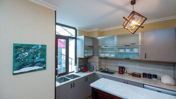 Shared fridge, microwave, electric kettle, highchair
