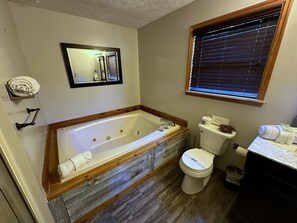 Jetted bath, hair dryer, towels, soap