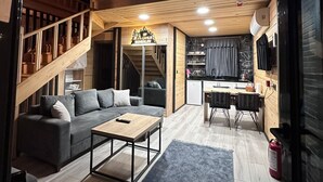 Bungalow – deluxe, fjellutsikt | Oppholdsområde