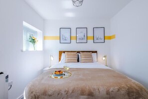 Apartament | 2 dormitoris, planxa i posts de planxar, wifi gratuïta i roba de llit