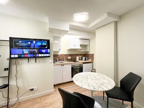 Fridge, oven, coffee/tea maker, toaster