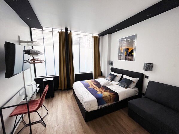 1 slaapkamer, een strijkplank/strijkijzer, gratis wifi, beddengoed