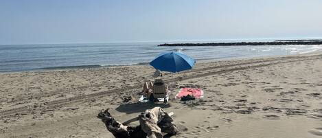 Espreguiçadeiras, toalhas de praia