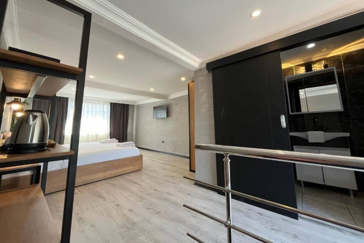 设计双人房 | 高档床上用品、迷你吧、笔记本电脑工作区、熨斗/熨板