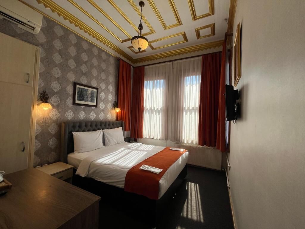 Standard Double Room | Premium bedding, minibar, laptop workspace, iron/ironing board