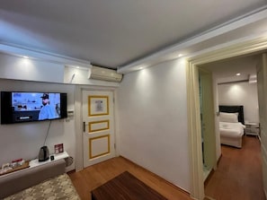 Basic Double Room | Living area | 23-inch TV with satellite channels