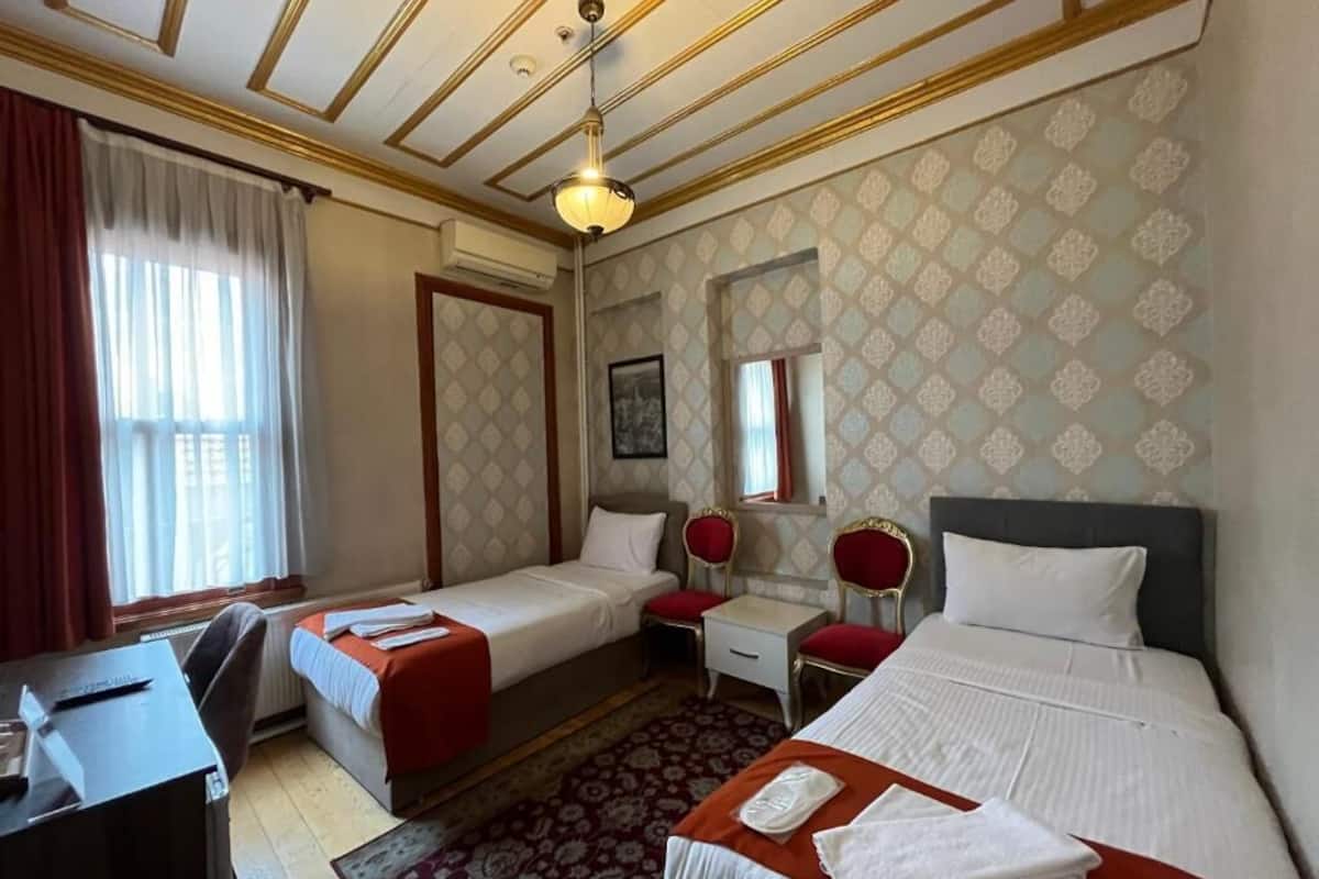 2 bedrooms, premium bedding, minibar, laptop workspace