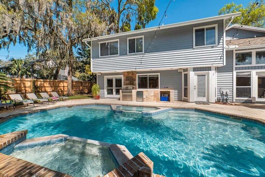 Spacious retreat just minutes from the beach with a stunning pool and game rooms