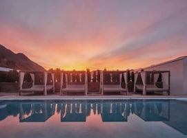 Outdoor pool, pool umbrellas, sun loungers