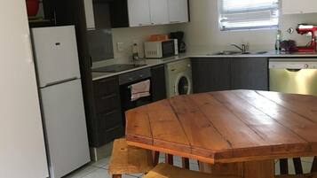 Apartment | Private kitchen | Fridge, microwave, oven, stovetop